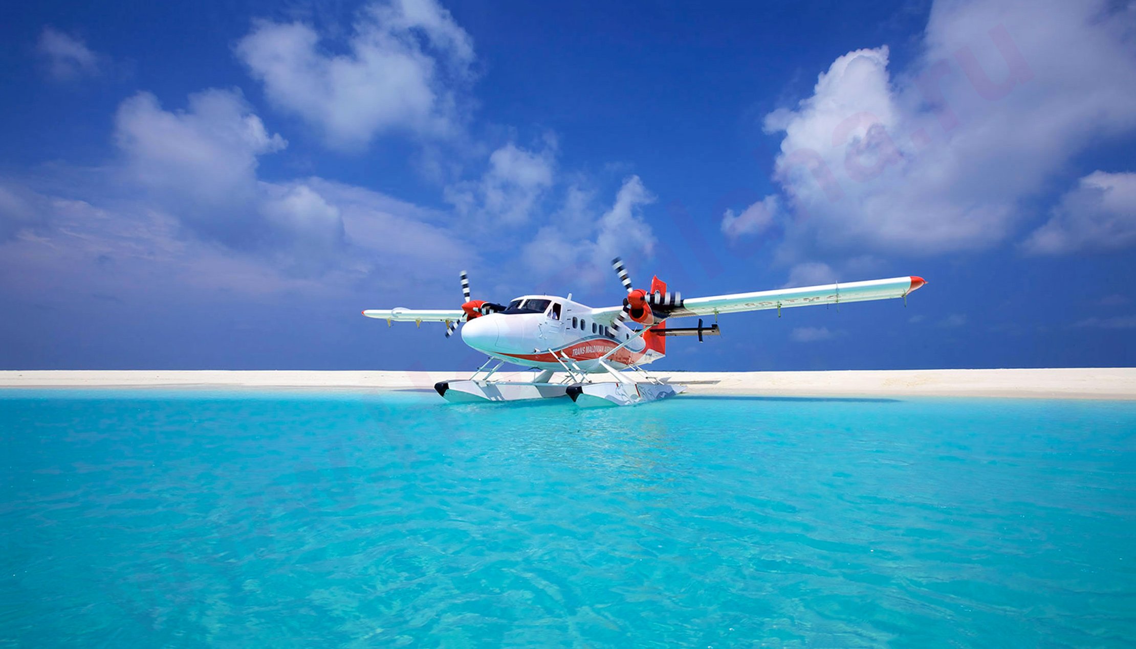 Самолет летающий по воде. Гидроплан Мальдивы. Гидроплан four Seasons Мальдивы. Гидросамолет Мале. Гидросамолет на Бали.